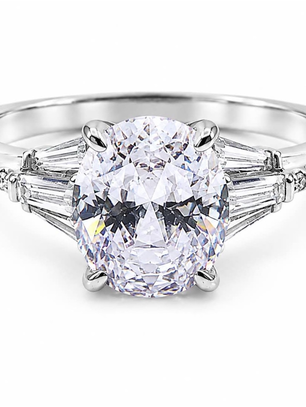 Oval White CZ Engagement Ring with Tapered Baguette Accents